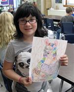 Elementary Student with art work